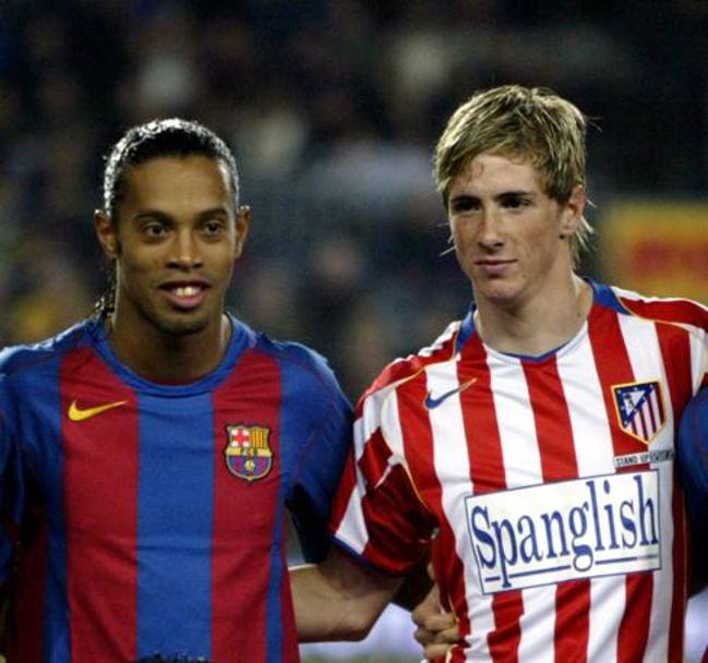 Con Ronaldinho quando il brasiliano giocava nel Barcellona (Reuters)